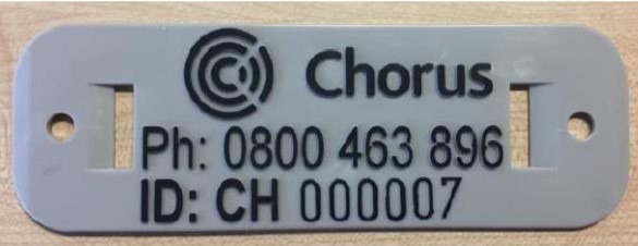 A photo of Chorus pole identification tag.